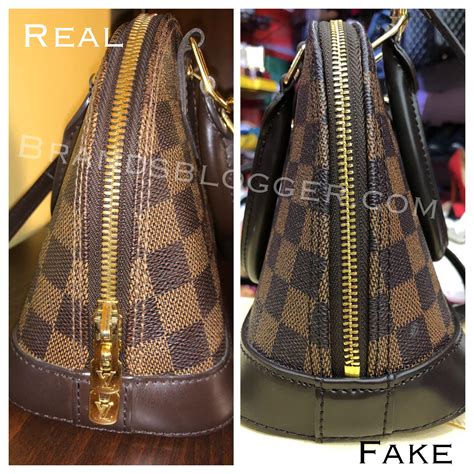 how to tell if a louis vuitton purse is fake|More.